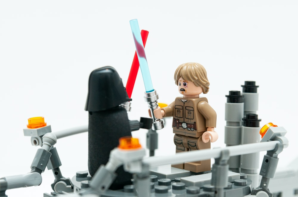 A Star Wars-inspired LEGO Set Showing Darth Vader and Luke Skywalker in a Lightsaber Duel