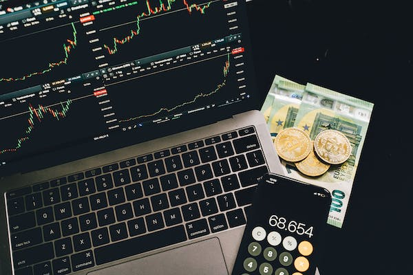 trading essentials with cash and coins
