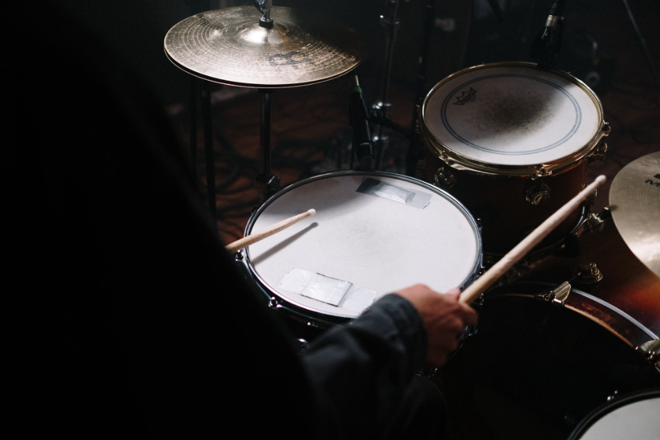 Man playing drums.