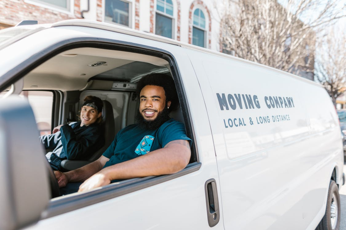 A moving company professional movers in a van
