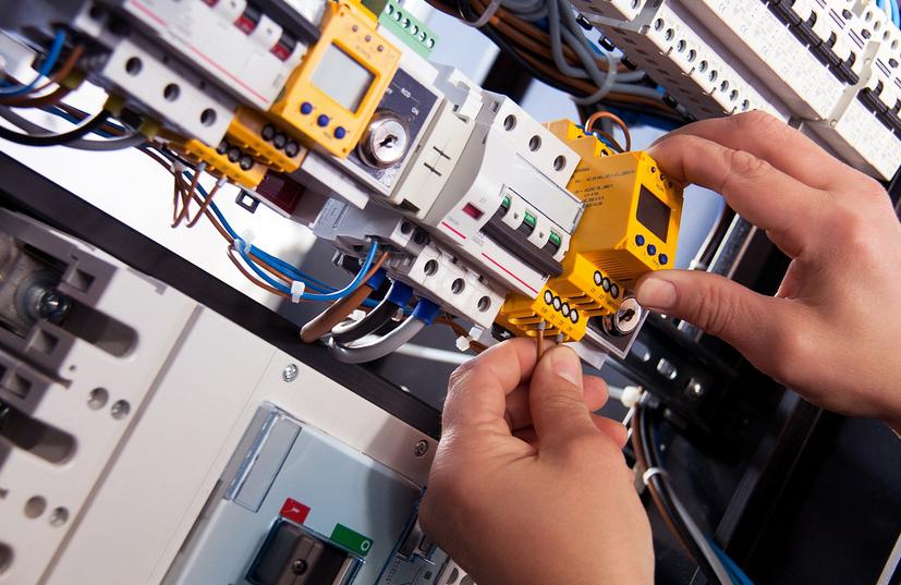 A person fixing electrical wiring