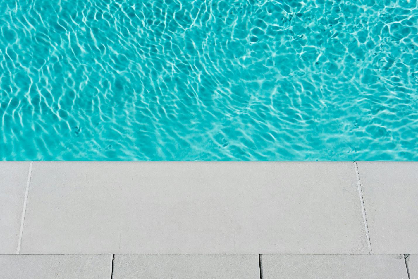 Edge of a pool made by pool contractors in LA