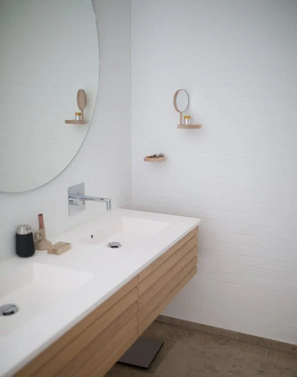 An image of a sink in a bathroom   