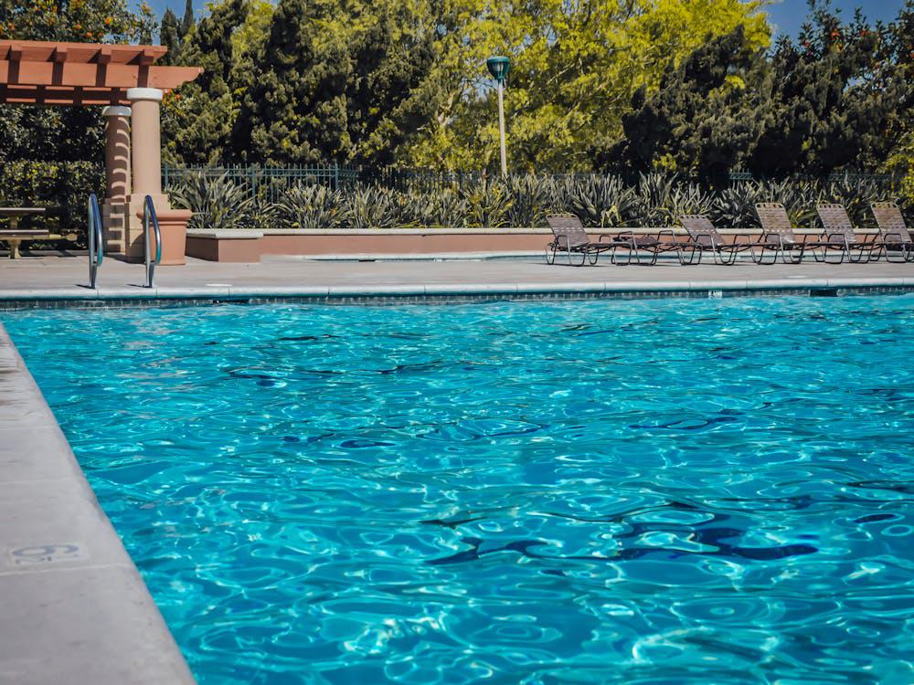 A commercial swimming pool with handrails